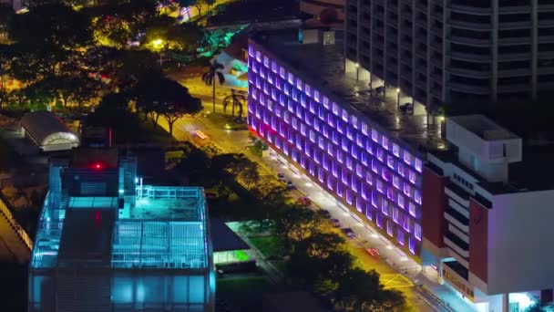 Το βράδυ φωτίζεται Σιγκαπούρη διάσημο εργασίας λιμάνι panorama στον τελευταίο όροφο 4k πάροδο του χρόνου — Αρχείο Βίντεο
