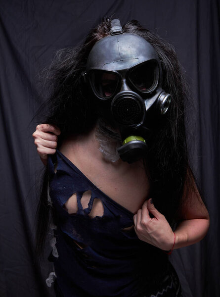 Girl in a gas mask, pandemic virus covid2019
