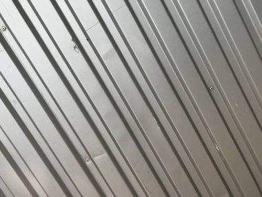 Işık ve gölgeli çizgili metal yaprak dokusu