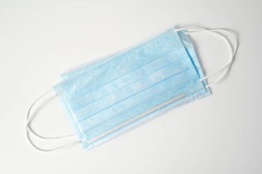 Virüslere karşı korumak için tıbbi koruyucu maske.