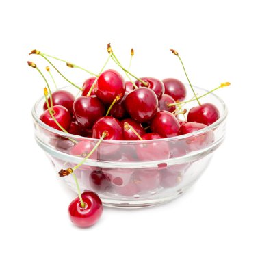 Beyaz bir cam kasede olgun ve sulu kiraz