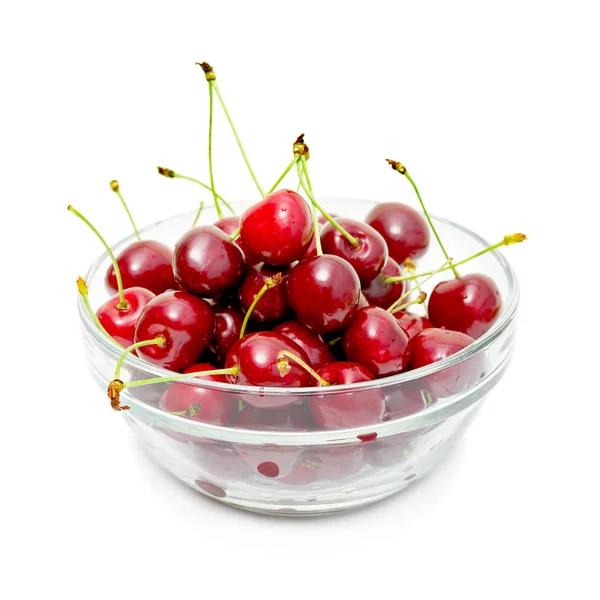 Beyaz bir cam kasede olgun ve sulu kiraz