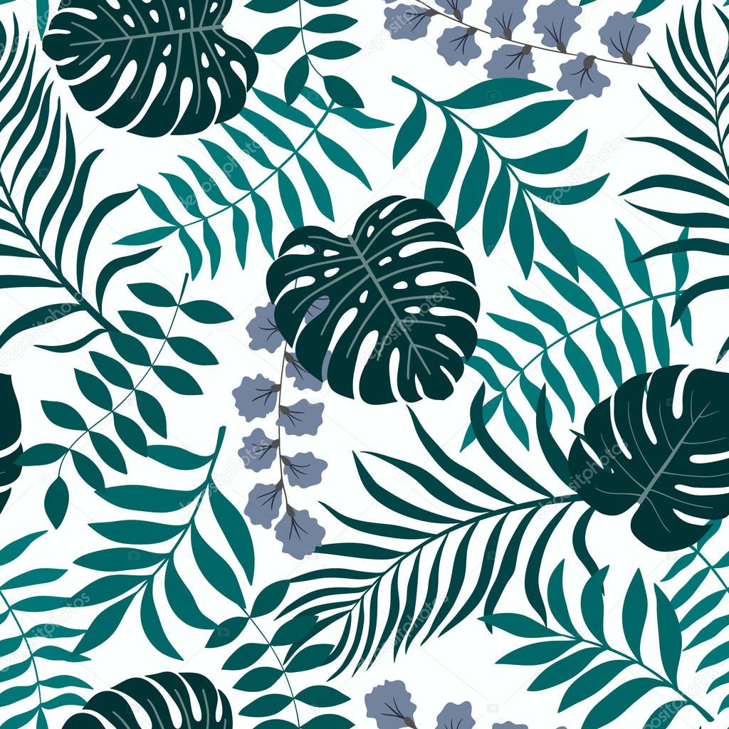 Tropical background with palm leaves. Seamless floral pattern. 
