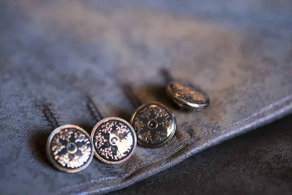 Metal buttons of the groom's suit jacket — Stock Photo, Image