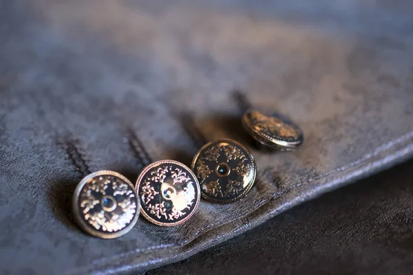 Metal buttons of the groom's suit jacket — Stock Photo, Image