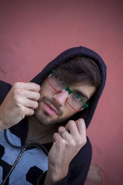 Boy with black sweatshirt and hood portrait — Stock Photo, Image