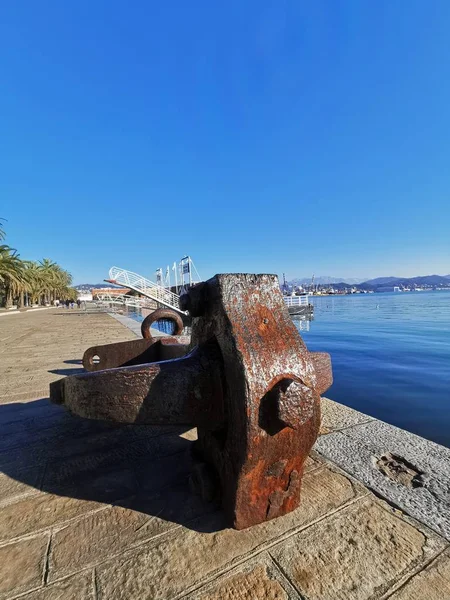 Anchor from boat on quay of la spezia — Stock Photo, Image