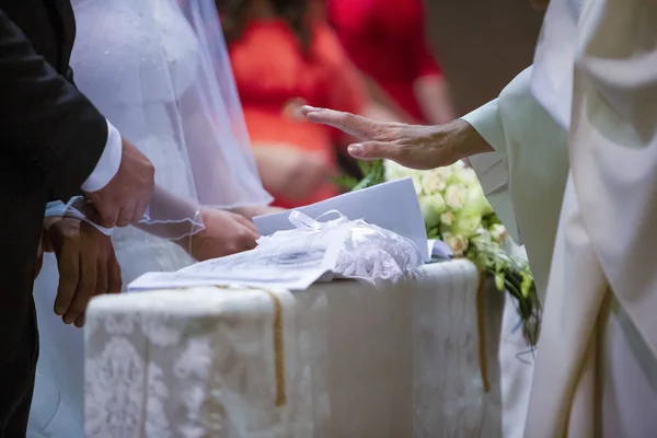 Blessing of the wedding rings by the priest bishop prelate — Stok fotoğraf