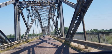metal road mount in Piacenza on sunny day bridge