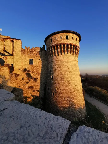 Brescia castle walls and fortified tower at sunset — 스톡 사진
