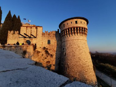 Brescia Castle, protective walls and tower in a beautiful sunny day