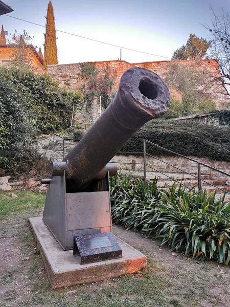 Ancient rusty medieval cannon on base brescia — Stock Photo, Image