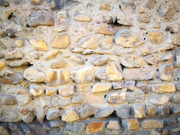 Vieux mur de pierre et fond de motif de brique dans la journée ensoleillée — Photo