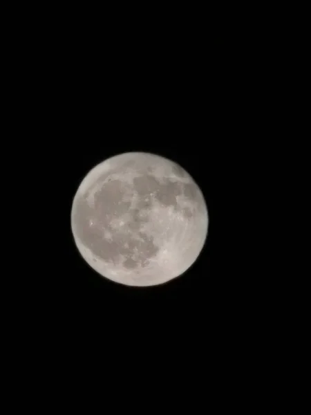 beautiful full moon in clear black sky