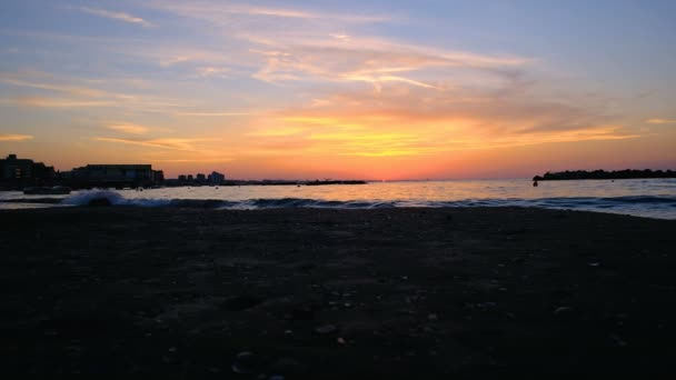Rimini beach beautiful sunset with bright colors and sea — стоковое видео