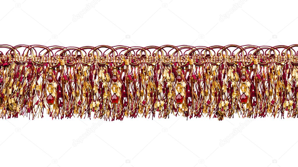 The fringe is multi-colored. Weaving of yellow and burgundy threads, alternating with beads of colored stones. Isolated on a white background.