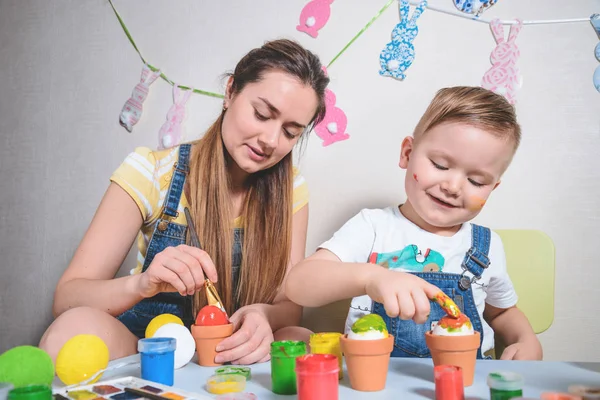 Smilling boy making bunny for easter — Stock Photo, Image