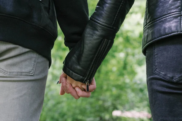 Closeup of loving couple holding hands — Stock Photo, Image