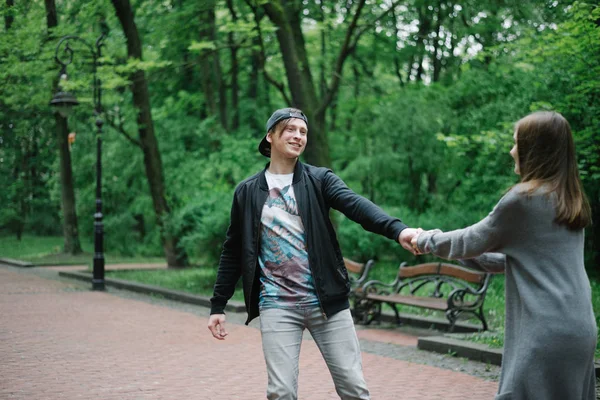 Lovely cople  running and play in the park — Stock Photo, Image