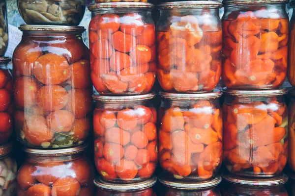 Jars with pickled vegetables. Preserved food