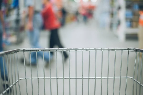 View from the cart on blured store — Stock Photo, Image