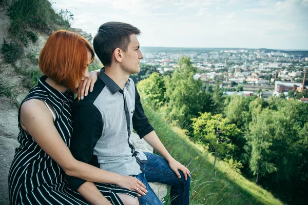 Couple holding hands and looking at the panorama of Lviv, Ukraine — Stock Photo, Image