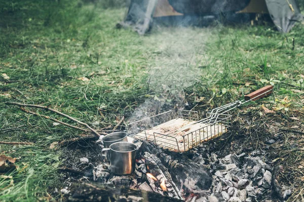 top view on bonfire with chicken meat