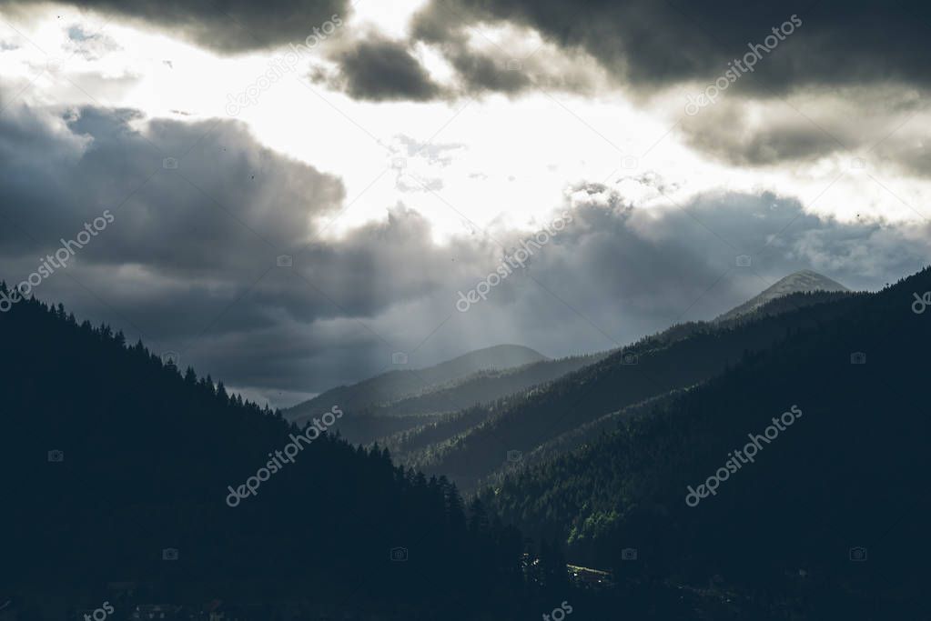 beautiful landscape of sunset in mountains with clouds