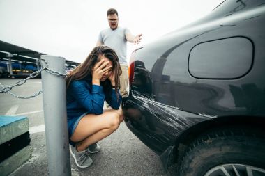 man shout on woman because of scratched car clipart