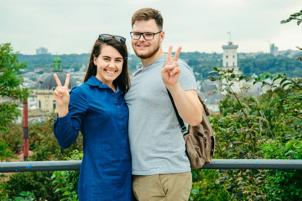 couple with european city on background