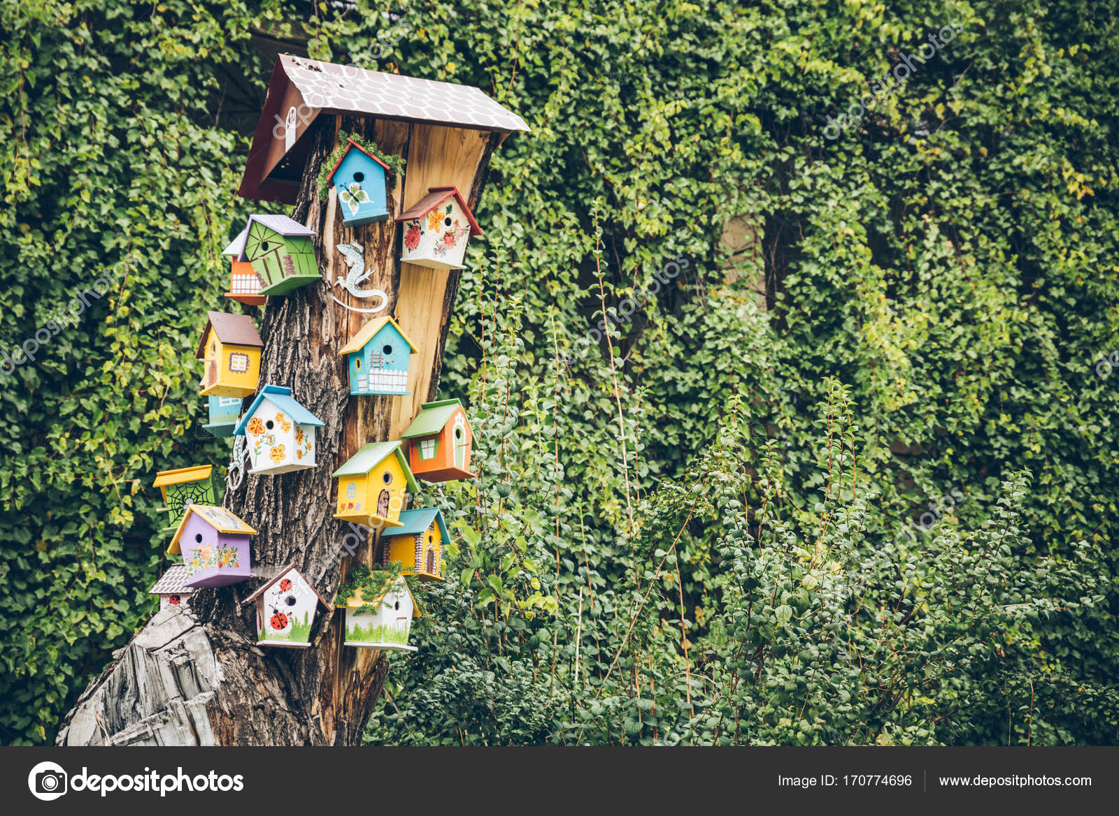 Bird houses on the tree Stock Photo by ©Vera_Petrunina 170774696