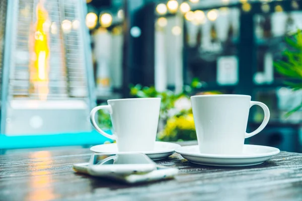 Outside cafe table with two cups on it — Stock Photo, Image