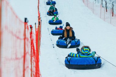 line for snow tubing. pull people up to hill.