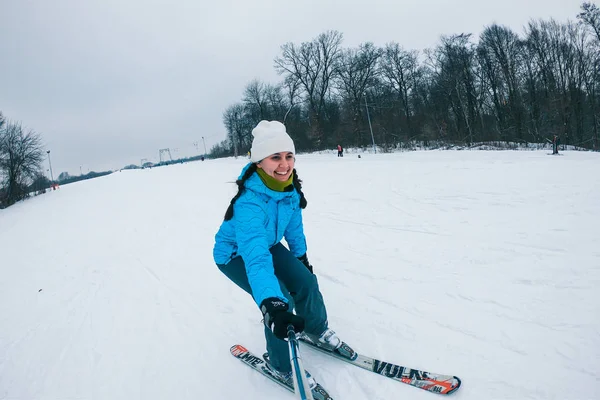 Kazkova Polyana, Ukraine - January 26, 2019: woman taking selfie while ski down by snowed hill — 图库照片