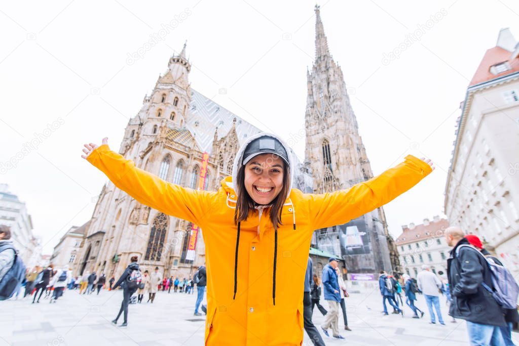smiling happy woman portrait in front of vienna cathedral church