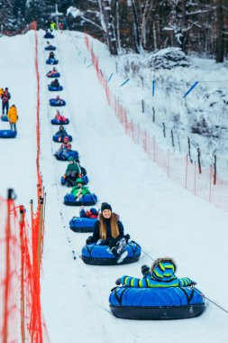 line for snow tubing. pull people up to hill.
