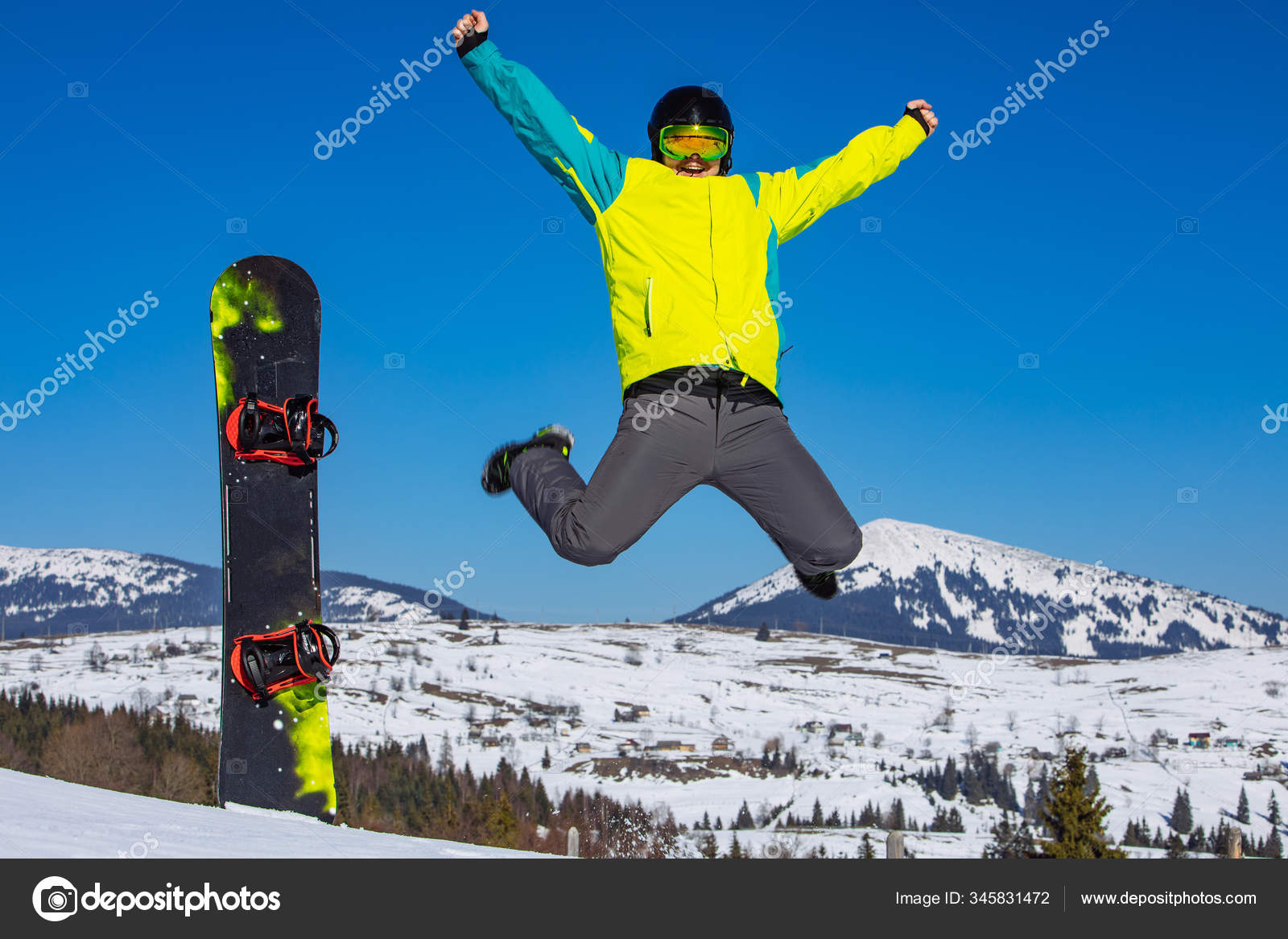 Homme Avec Des Lunettes De Neige Tenant Un Snowboard