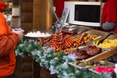 Lviv, Ukraine - January 4, 2019: street food fest burgers and hot dogs close up