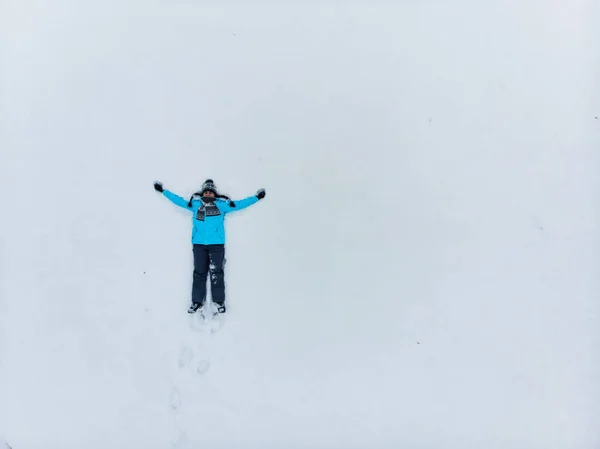 Overhead View Woman Making Snow Angel Winter Season — Stock Photo, Image