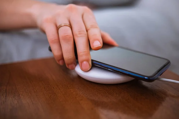 Woman Hand Close Putting Phone Wireless Charger Morning Time — Stock Photo, Image