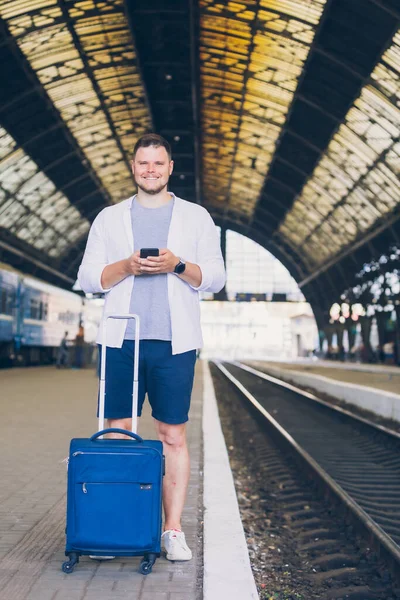 Man Standing Suitcase Railway Station Waiting Train Using Cellphone Surfing — Stock Photo, Image