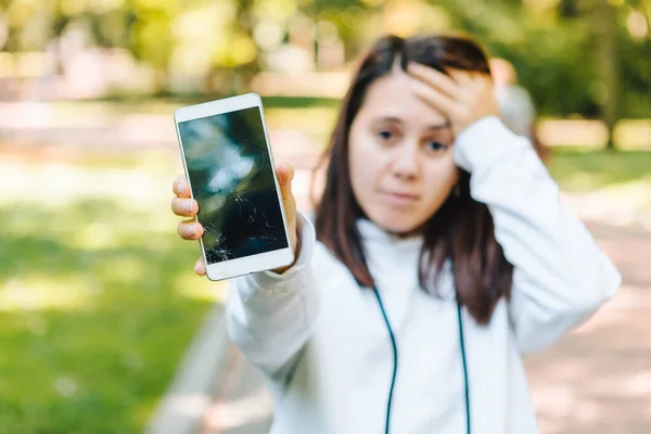 Sad Woman Showing Cracked Mobile Screen Drop Device Insurance Repair — Stock Photo, Image