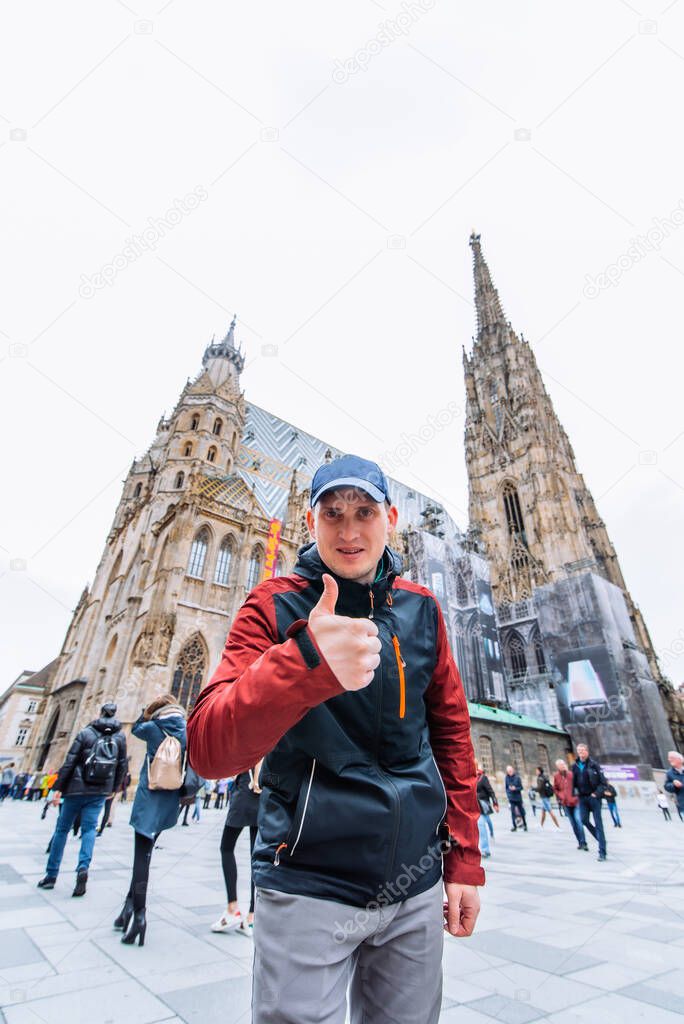 man portrait in front of vienna cathedral church spring season travel concept