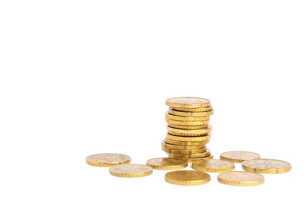 Stack of golden coins at white background. — Stock Photo, Image
