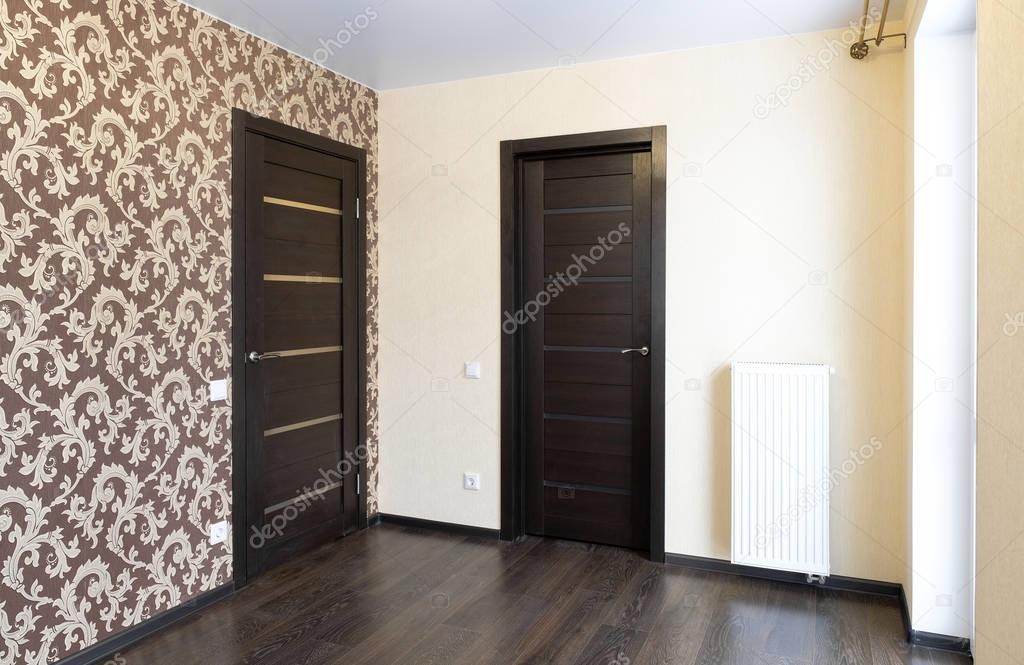 New apartment, empty room, entrance door