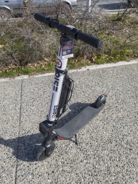 Thessaloniki, Greece - February 03 2020: Parked Rise electric Scooter rental without passenger.