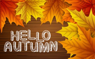 Ahşap arka plan üzerinde yazı ile sonbahar yaprakları