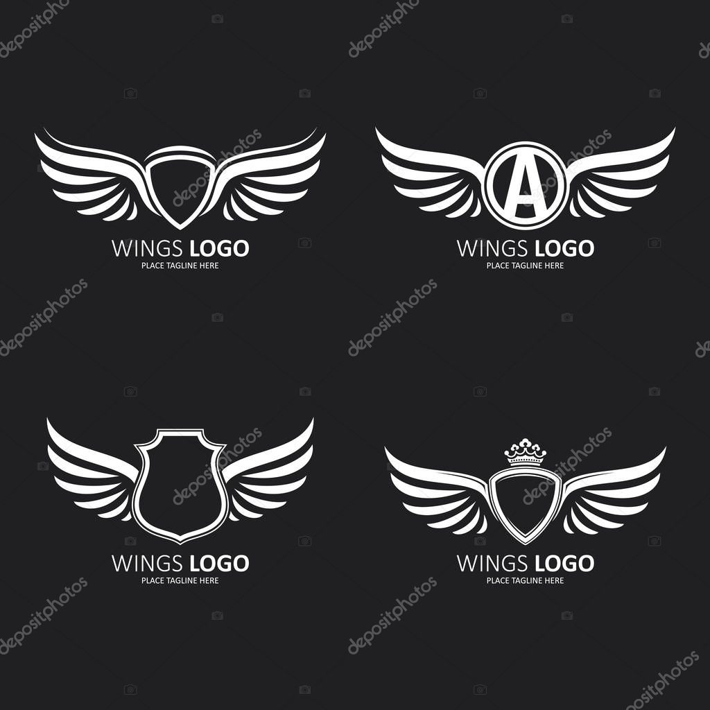 Set of heraldic winged shields in different shapes with crowns and Initial Letter A icon