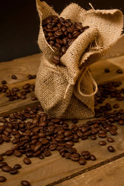 Roasted Black Coffee Beans Spilled Jute Bag Raw Planks Stock Photo
