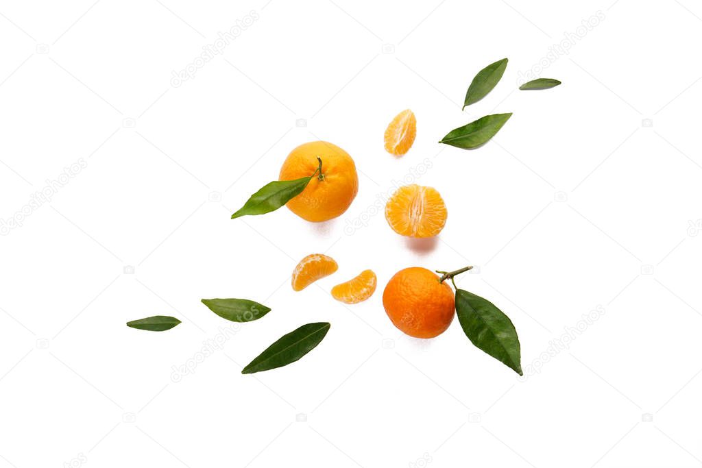 Flat lay isolated tangerines with leaf on white background.